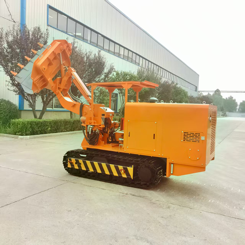 Гусеничный погрузчик с боковой разгрузкой камня