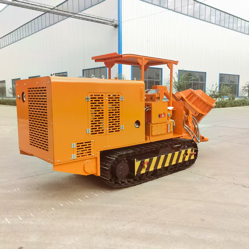 Гусеничный погрузчик с боковой разгрузкой камня