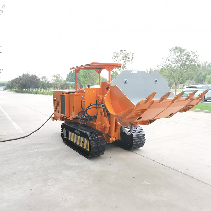 Máy xúc đá dỡ hàng bên khai thác